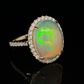 14 Karat Yellow Gold 5 5/8 Carat Oval Opal and Diamond Halo Ring