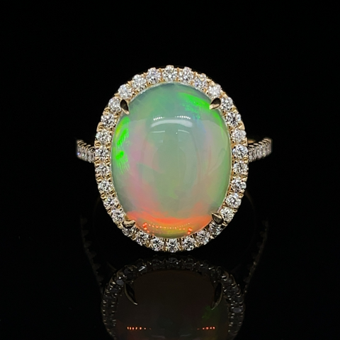 14 Karat Yellow Gold 5 5/8 Carat Oval Opal and Diamond Halo Ring