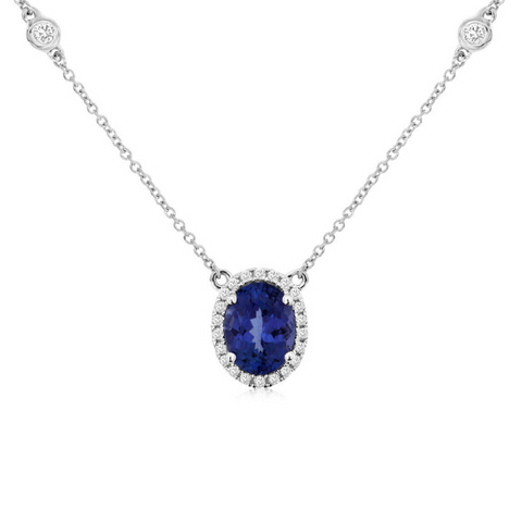 14 Karat White Gold Oval Tanzanite and Diamond Halo Necklace